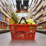 Basket with groceries in the supermarket